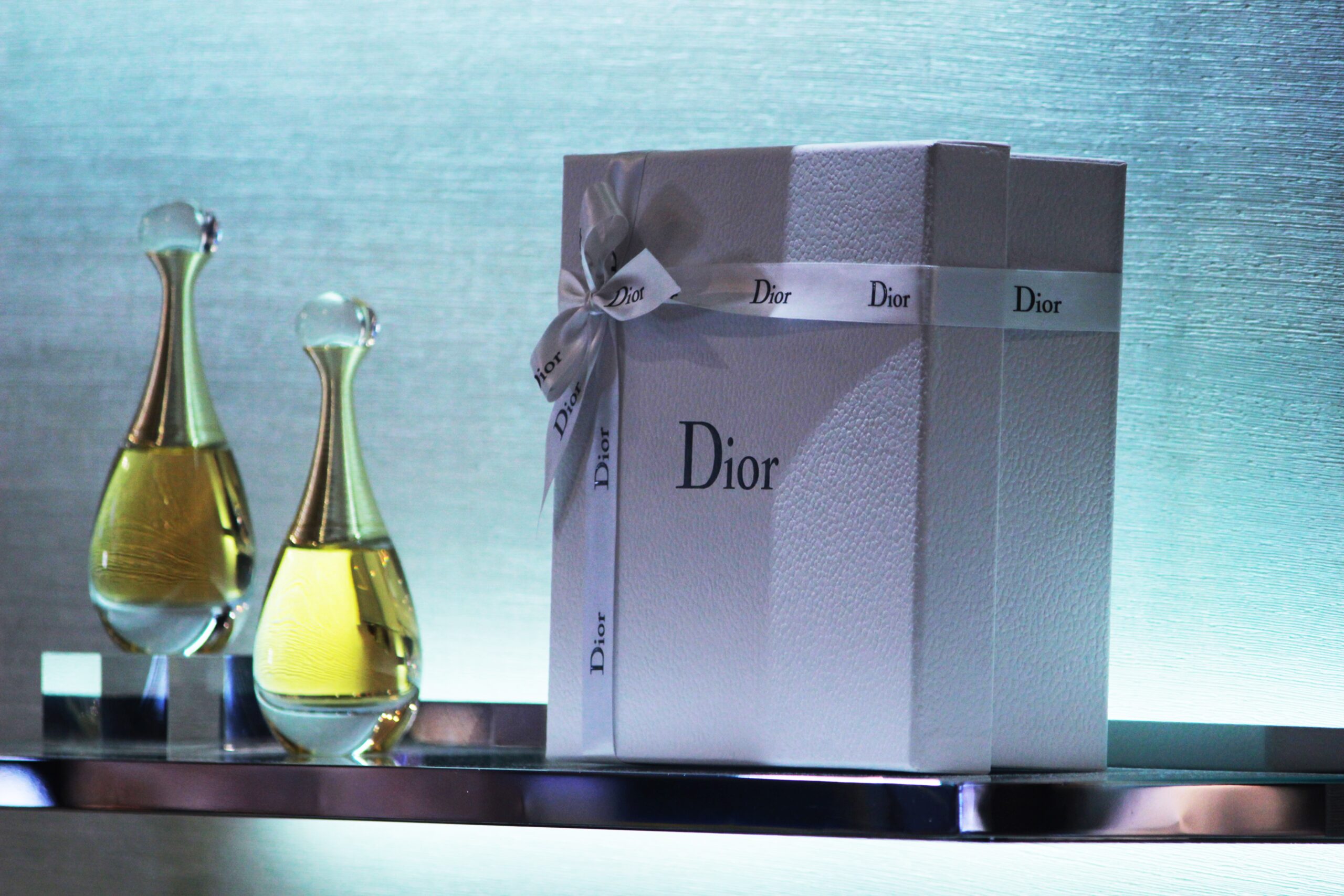 Dior box with two glasses of champagne.