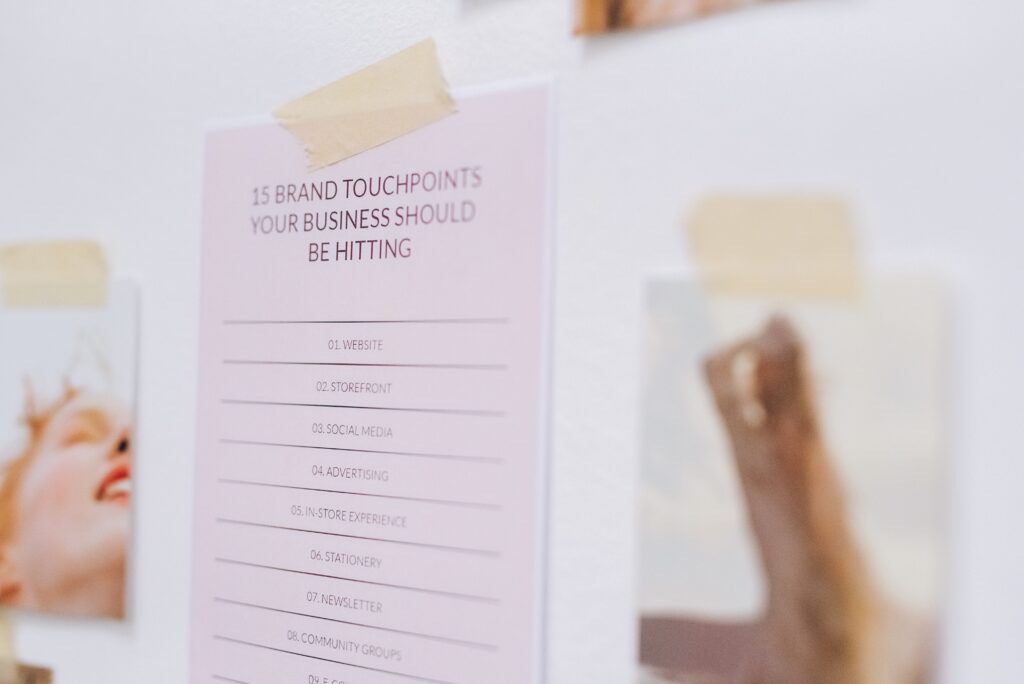 a piece of paper that lists 15 Brand Touchpoints Your Business Should Be Hitting